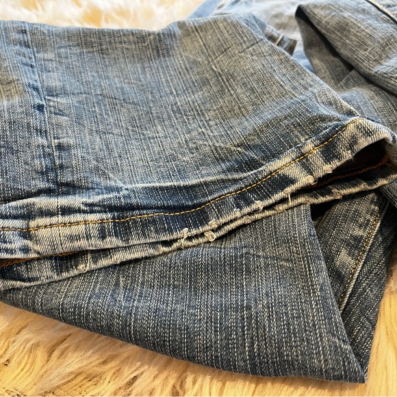 Torrid Blue Flare Jeans with Distressed Details - Picture 11 of 11
